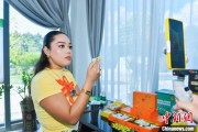占卦问卜泰国主播品三亚榴莲：“尝到了家乡味”